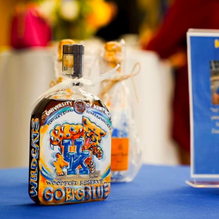 hand painted college graduation bourbon bottle