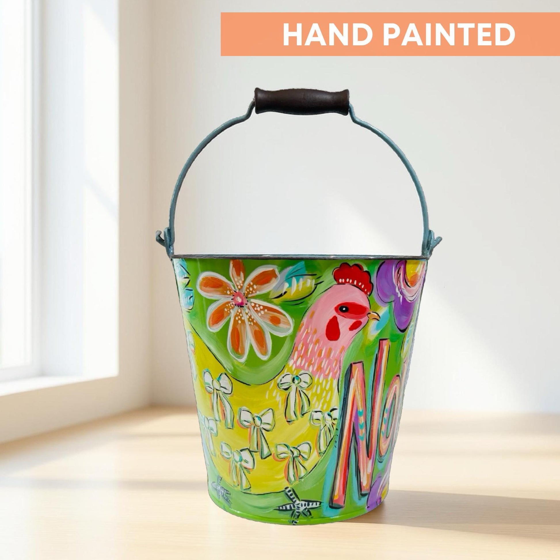 Personalized Easter Bucket Hand Painted Metal Pail Custom Name Design Floral Pattern Easter Basket Egg Hunt Container Green Pink Colors Spring Holiday Celebration Children Gift Idea Double Name Option Decorative Bow Keepsake Item Durable