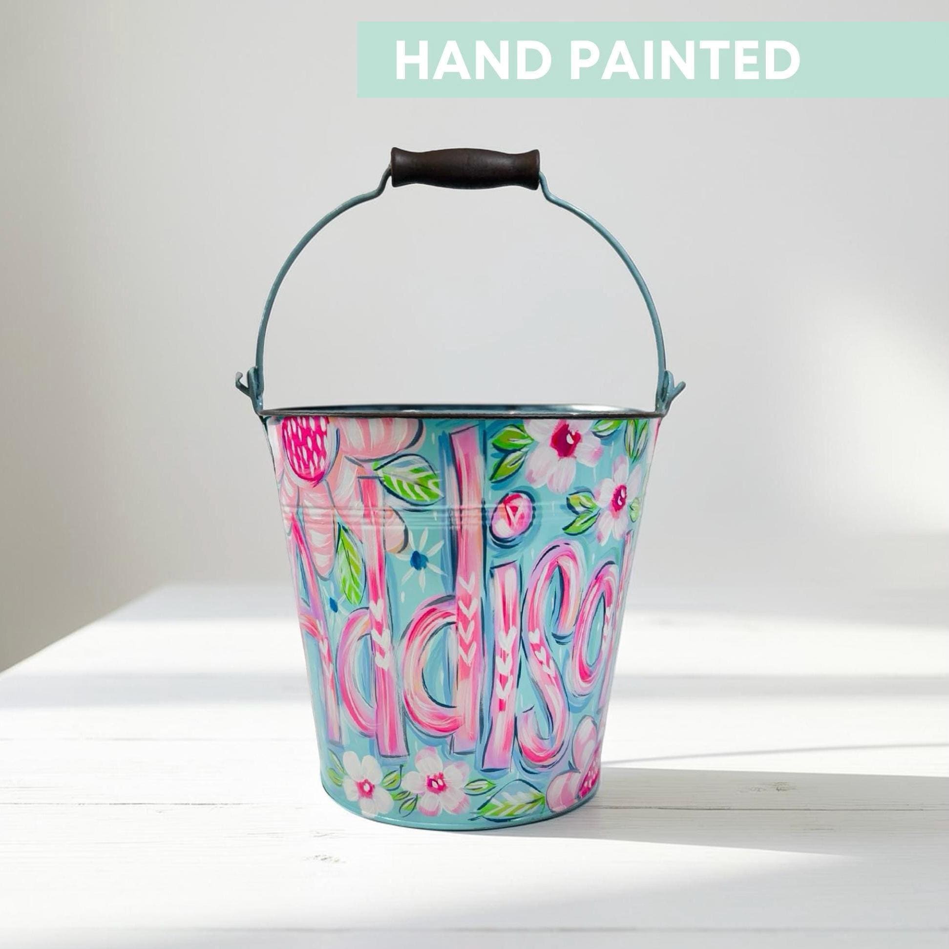 Personalized Easter Bucket Hand Painted Floral Design Custom Name Easter Basket Girl Gift Spring Celebration Metal Container Decorative Bow Easter Egg Hunt Basket Storage Solution Beautiful Spring Colors Customized Children Present Blue
